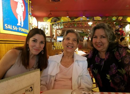 Three generations, a daughter, grandma and mom, enjoying lunch at a restaurant.